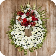 Historia de las coronas de flores y arreglos funerarios