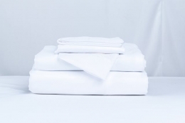 Calandra planchadora y gestión inteligente de textiles profesionales