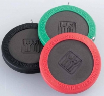 Tecnología Nikken en una moneda